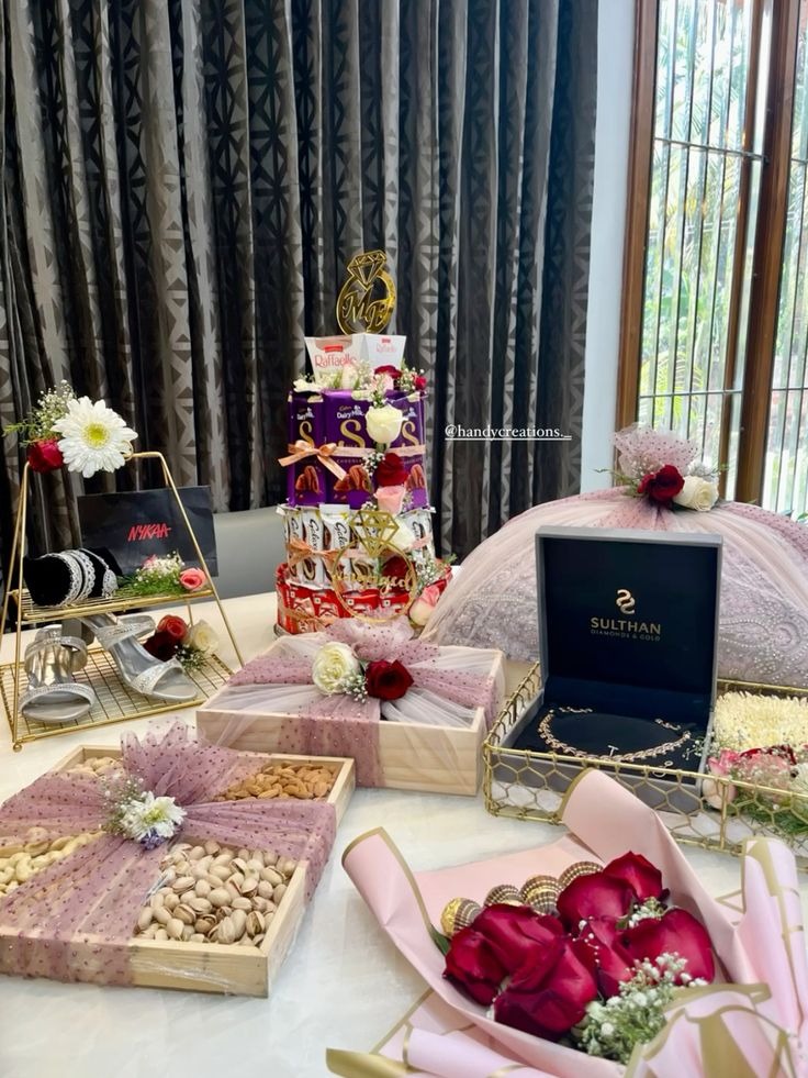 Chocolate tower with gift trays, dry fruits, jewelry and roses